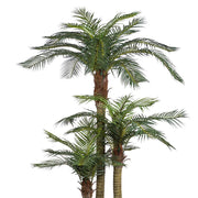 Közelkép az élethű mű areca pálma zöld leveleiről