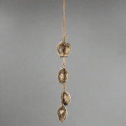 Aranyszínű karácsonyi kolomp szett.