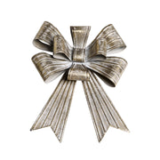 Rézszínű, fémből készült karácsonyi dekor masni.