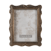 Aranyszínű asztali fényképtartó.