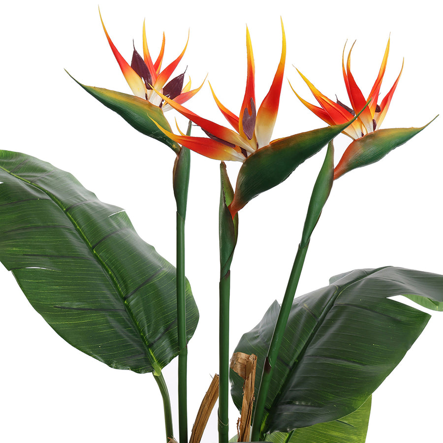 Papagájvirág műnövény élethű zöld levelekkel és virágzó kialakítással.