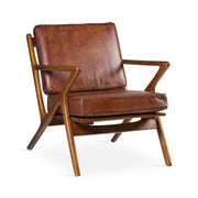 Teakfából készült, antikolt dohánybarna színű bőrrel kárpitozott, kézműves design fotel.