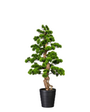 Zöld színű, mű fenyő bonsai fa, fekete színű műanyag cserépben.