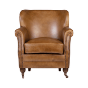 Konyakszínű marhabőrrel kárpitozott, szárnyas bőrfotel.