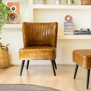 Cadillac bőr klubfotel stíluskép világos enteriőrben