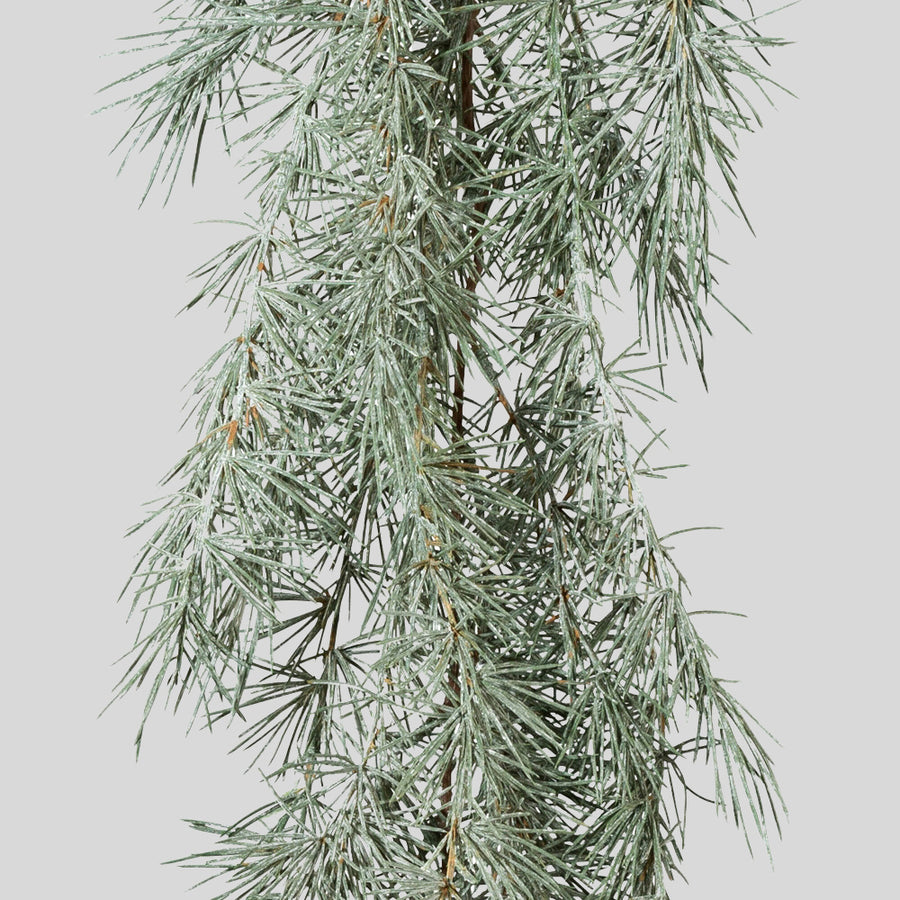 Hamvaszöld színű, mű cédrusfenyő girland.