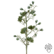 Zöld színű, mű cédrusfenyőág.