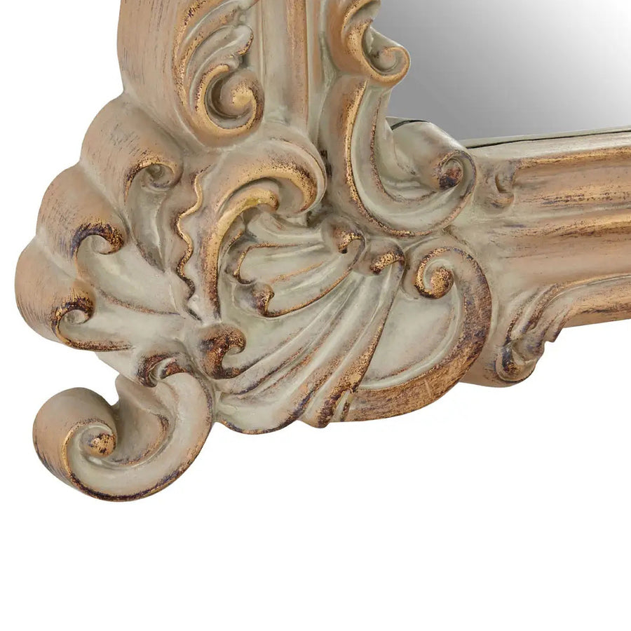 Antikolt felületű, natúr színű, fa hatású díszes falitükör.