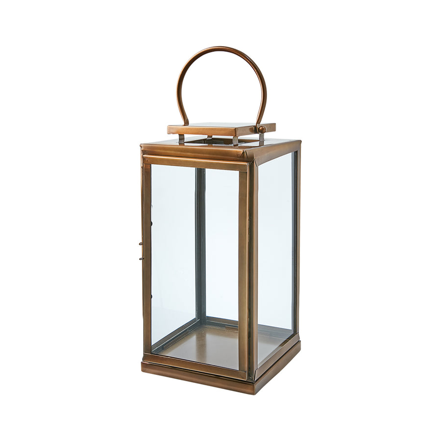 Modern, kortárs stílusú, rozsdamenetes acélból készült, sárgarézszínű lámpás.