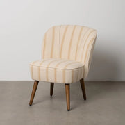 CLUB EMMA fotel okker-fehér csíkozással, betonpadlón, minimalista környezetben.