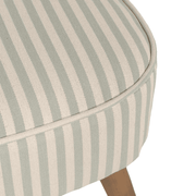 Ülőfelület részletkép, sűrű szövésű, zöld-fehér textilborítással.