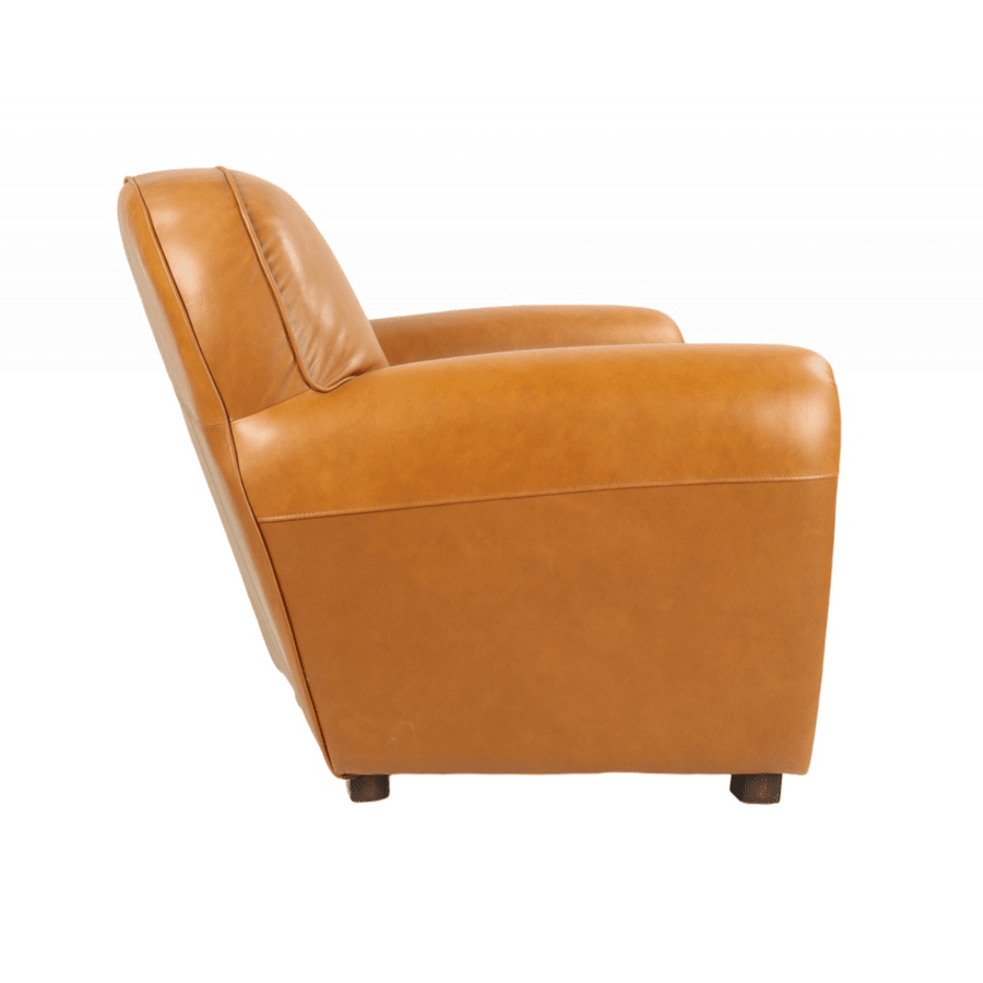 Cserszínű valódi marhabőrrel kárpitozott klubfotel.