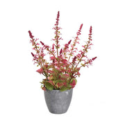 Szürke színű cserépbe helyezett, mű levendula bokor.