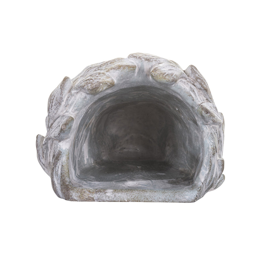 Szürke színű, falra helyezhető női kaspó büszt.