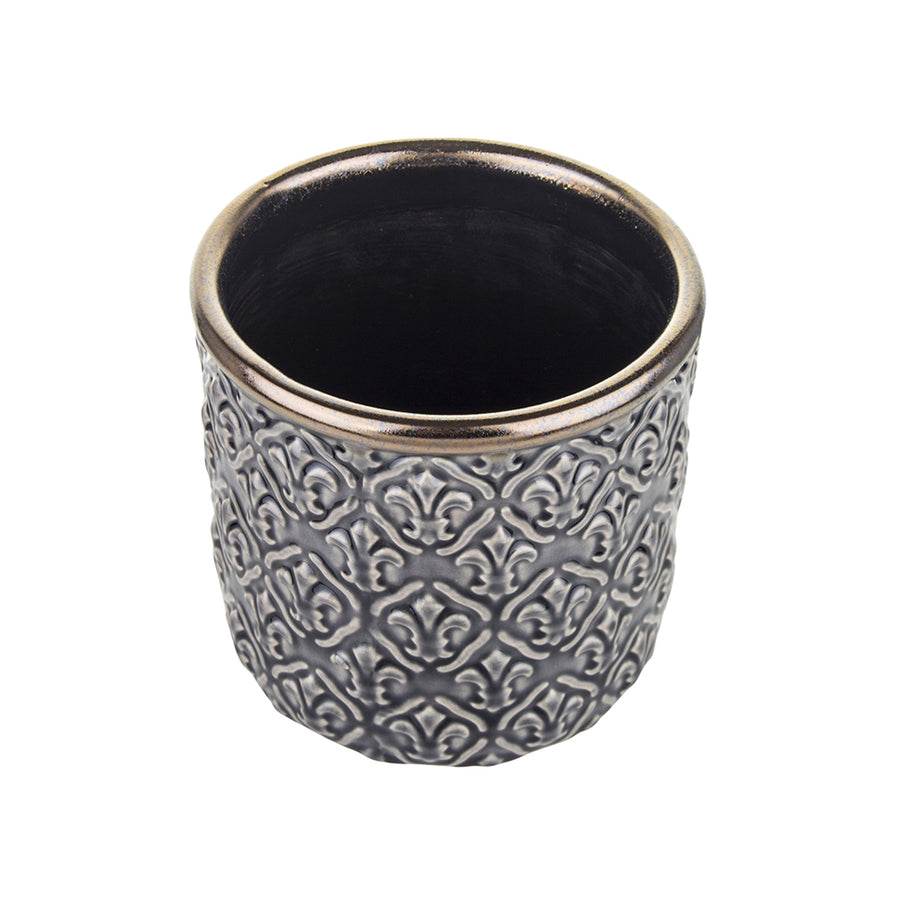 Felülnézetből készült fotó a Dalia kaspó belső részéről és pereméről