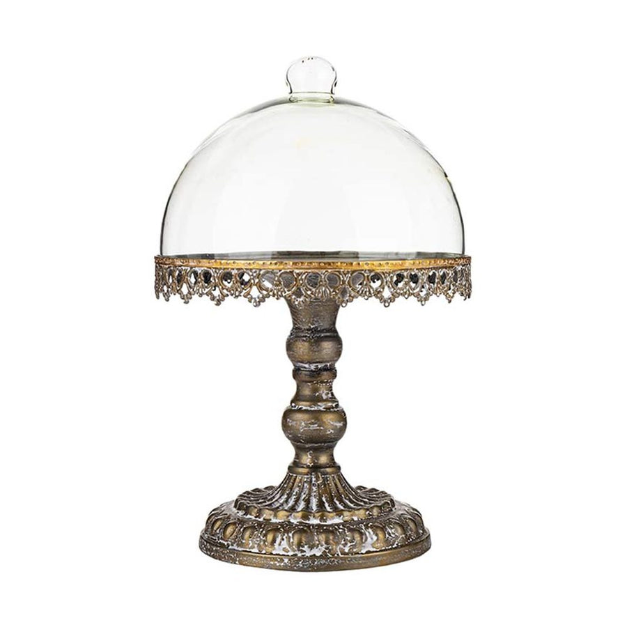 Óarany színű fémből készült, díszes kialakítású süteményes állvány üvegbúrával.