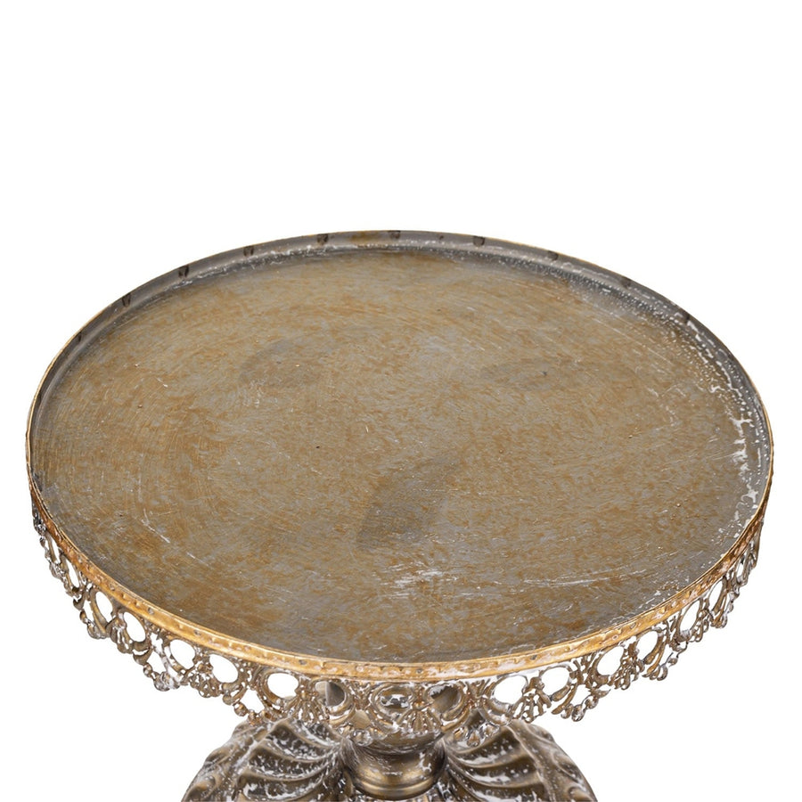 Óarany színű fémből készült, díszes kialakítású süteményes állvány üvegbúrával.