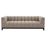 Bézs színű szövettel kárpitozott, prémium minőségű, formatervezett design kanapé.