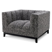 Fekete színű szövettel kárpitozott, prémium minőségű, formatervezett design fotel.