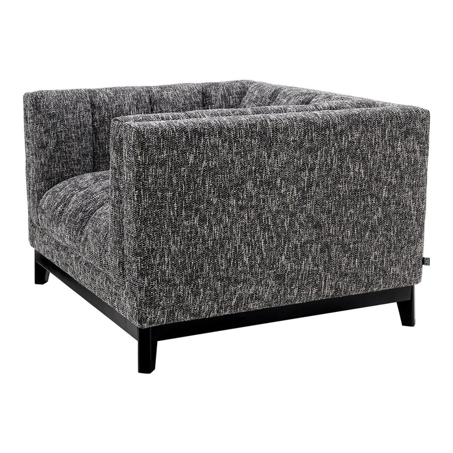 Fekete színű szövettel kárpitozott, prémium minőségű, formatervezett design fotel.