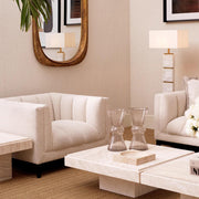 Krémszínű buklé szövettel kárpitozott, prémium minőségű, formatervezett design fotel.