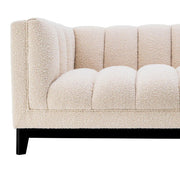 Krémszínű buklé szövettel kárpitozott, prémium minőségű, formatervezett design kanapé,