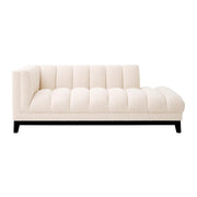 Krémszínű buklé szövettel kárpitozott, prémium minőségű, formatervezett design szófa.