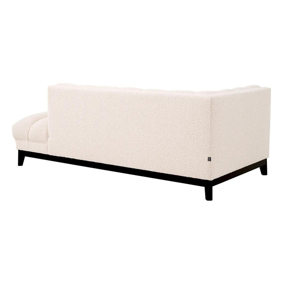 Krémszínű buklé szövettel kárpitozott, prémium minőségű, formatervezett design szófa.