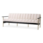 Krémszínű buklé szövettel kárpitozott, prémium minőségű, formatervezett design kanapé.