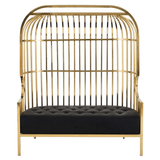 Aranyszínű, kalitka formájú design kanapé.