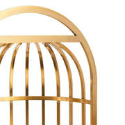 Aranyszínű, kalitka formájú design fotel.