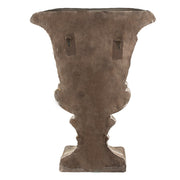 A kaspó hátoldala, ahol jól láthatók a fali rögzítéshez szükséges akasztók