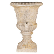 Antik hatású, félköríves kialakítású, angyaldíszítéses bézs fali kaspó elölről, klasszikus talpas lábazattal