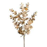 Aranyszínű, mű eukaliptusz ág.