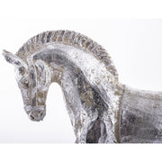 Antikolt felületű, ezüst színű karácsonyi hintaló figura.