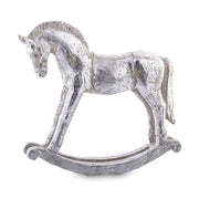 Antikolt felületű, ezüst színű karácsonyi hintaló figura.