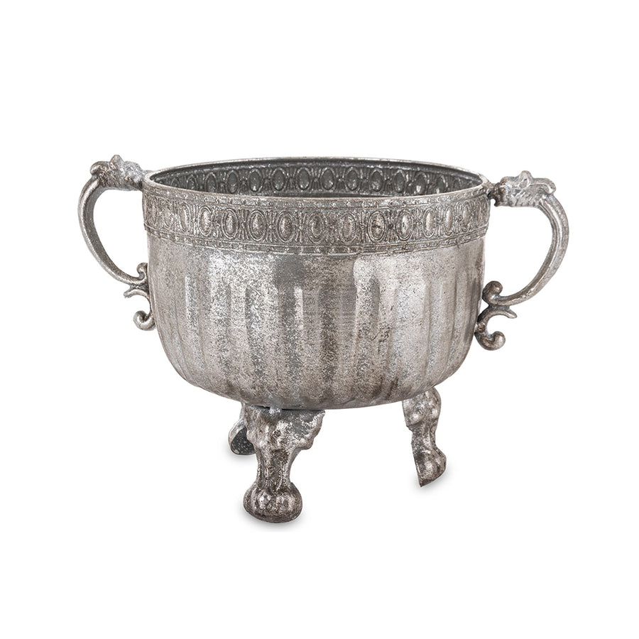 Ezüstszínű, dombormintával díszített, lábakon álló fém kaspótál.