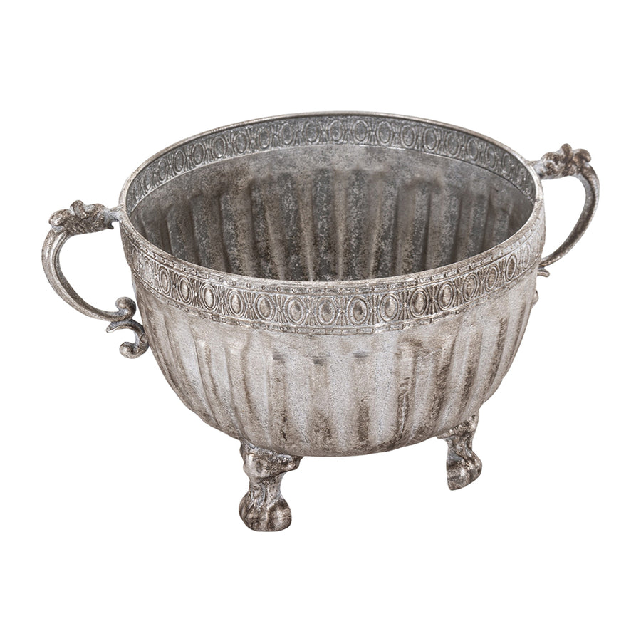 Ezüstszínű, dombormintával díszített, lábakon álló fém kaspó tál.