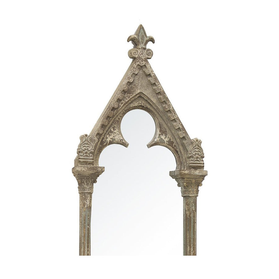 Historikus megjelenésű,, fából faragott, antikolt felületű falitükör.