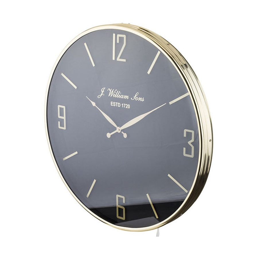 Fekete-arany színű falióra.