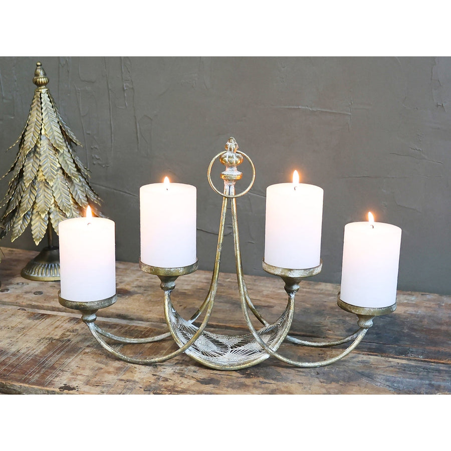Rézszínű fémből készült, 4 ágú adventi gyertyatartó.