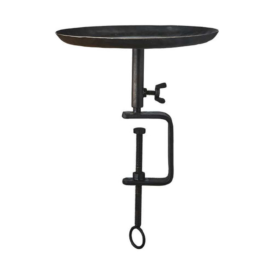 Fekete színű, vasból készült, kézműves gyertyatartó.