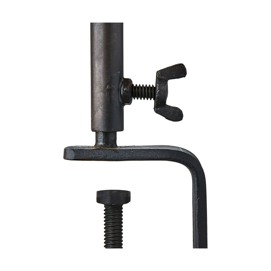 Fekete színű, vasból készült, kézműves gyertyatartó.