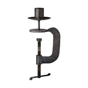 Kovácsoltvasból készült, kézműves gyertyatartó.