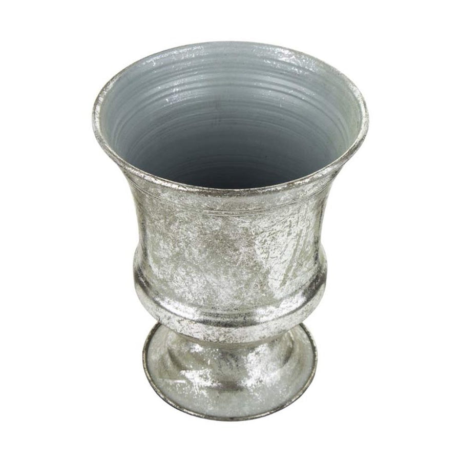 Ezüst színű fém kaspó.