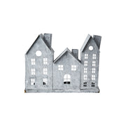 Szürke színű, bádogból készült házikókat formázó lámpás.