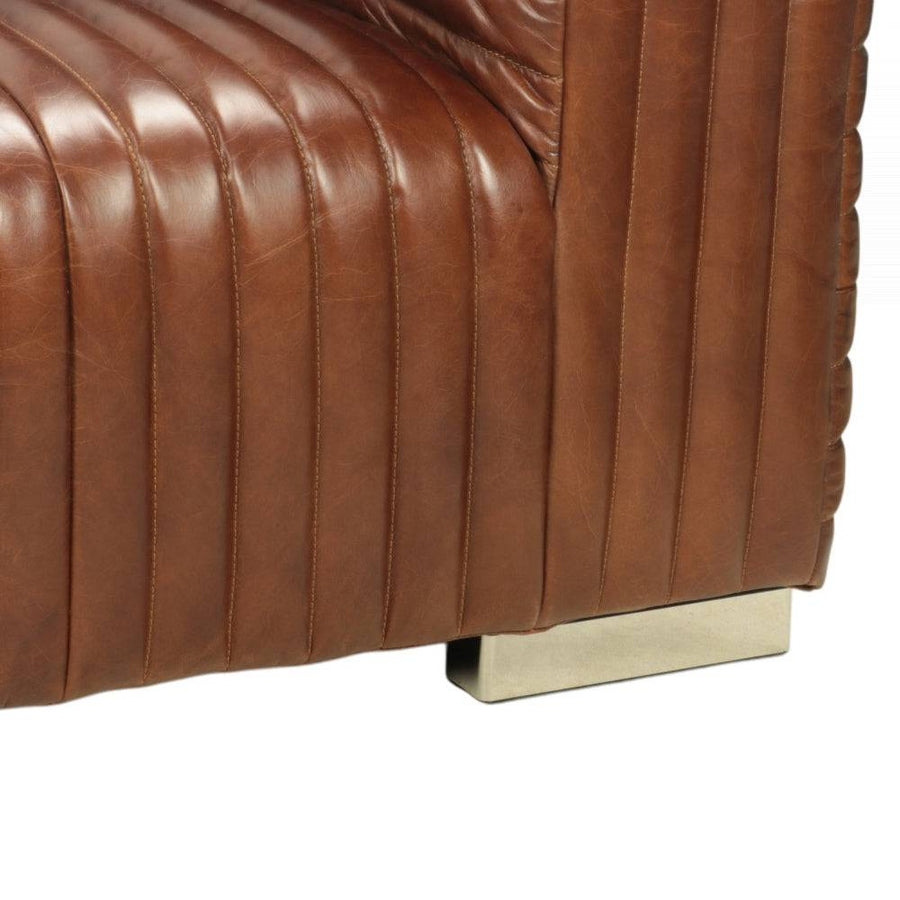 Georgio bőrkanapé krómozott fémláb részlet, minőségi bőrkárpit