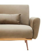 Cappuccinoszínű bársony kanapé.