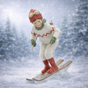 Heritage síelő kisfiú karácsonyi figura havas téli hangulatképben