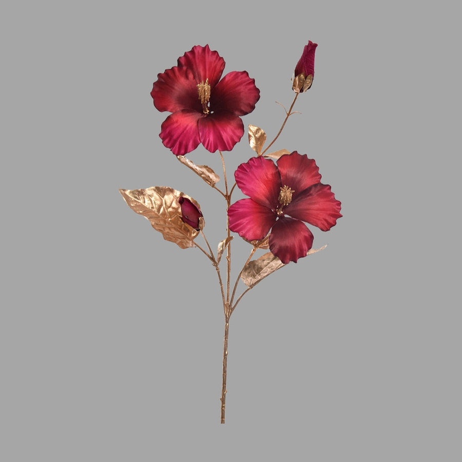 Fényes aranyszínű szárú és levelű, bíbor színárnyalatú mű hibiszkusz virág .